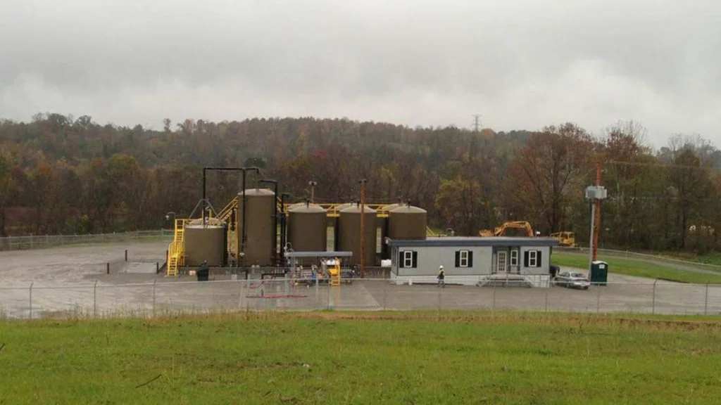 Water disposal injection facility and skid